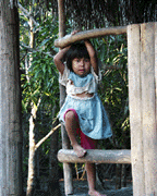 Girl hanging from porch